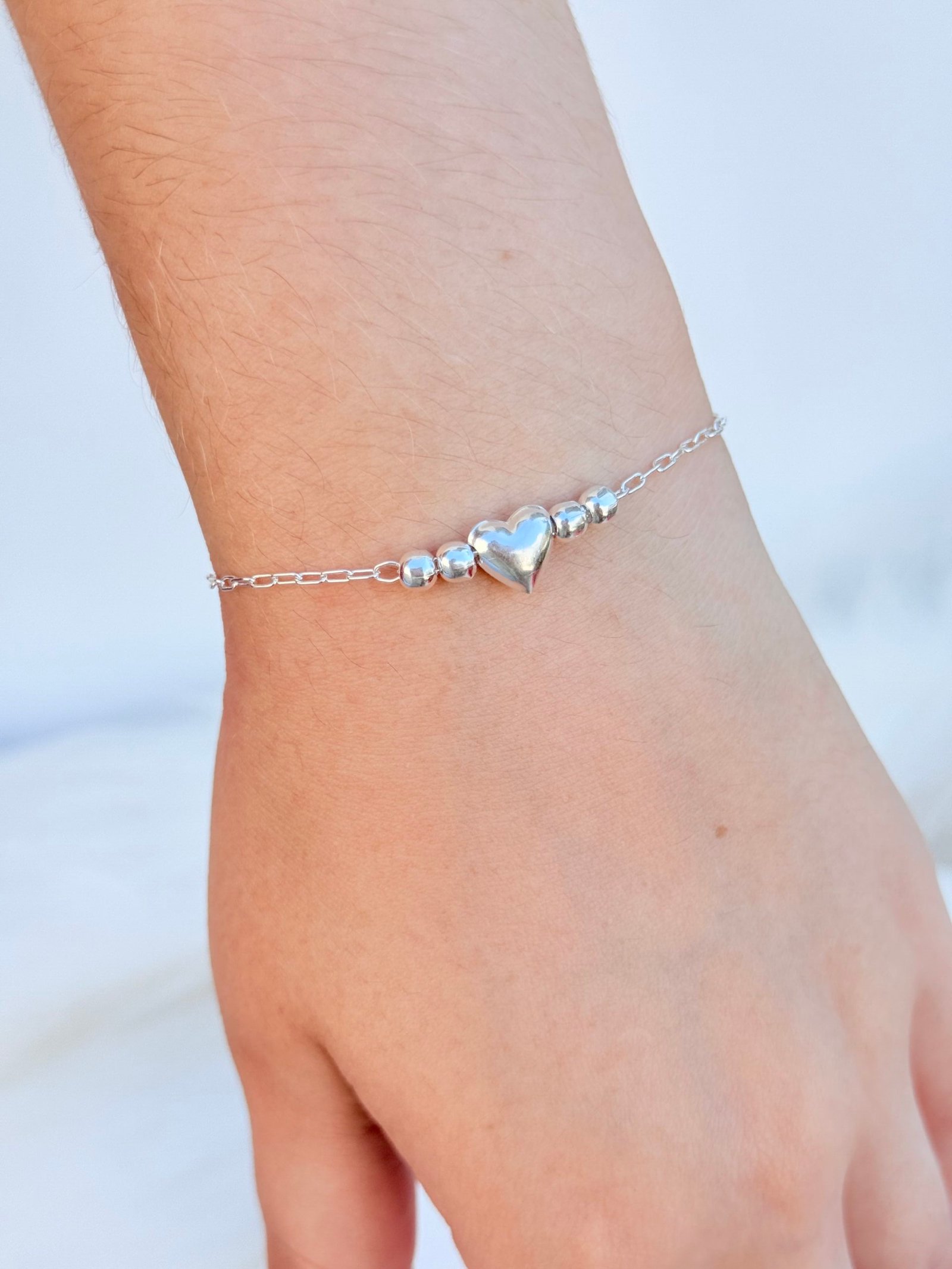 PULSEIRA EM PRATA 925 CORAÇÕES