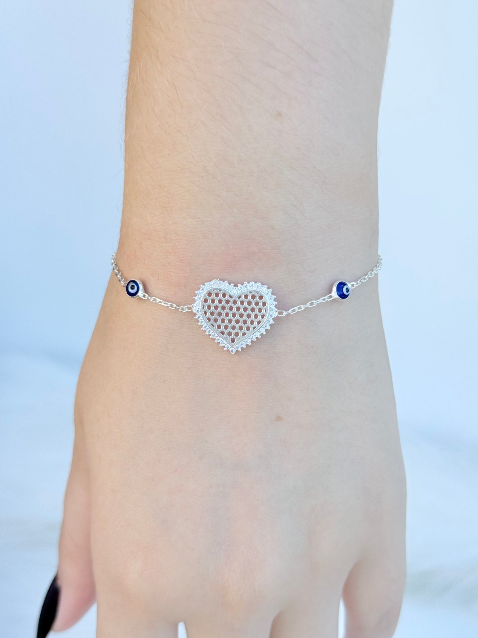 PULSEIRA EM PRATA 925 (CORAÇÃO E OLHO GREGO)