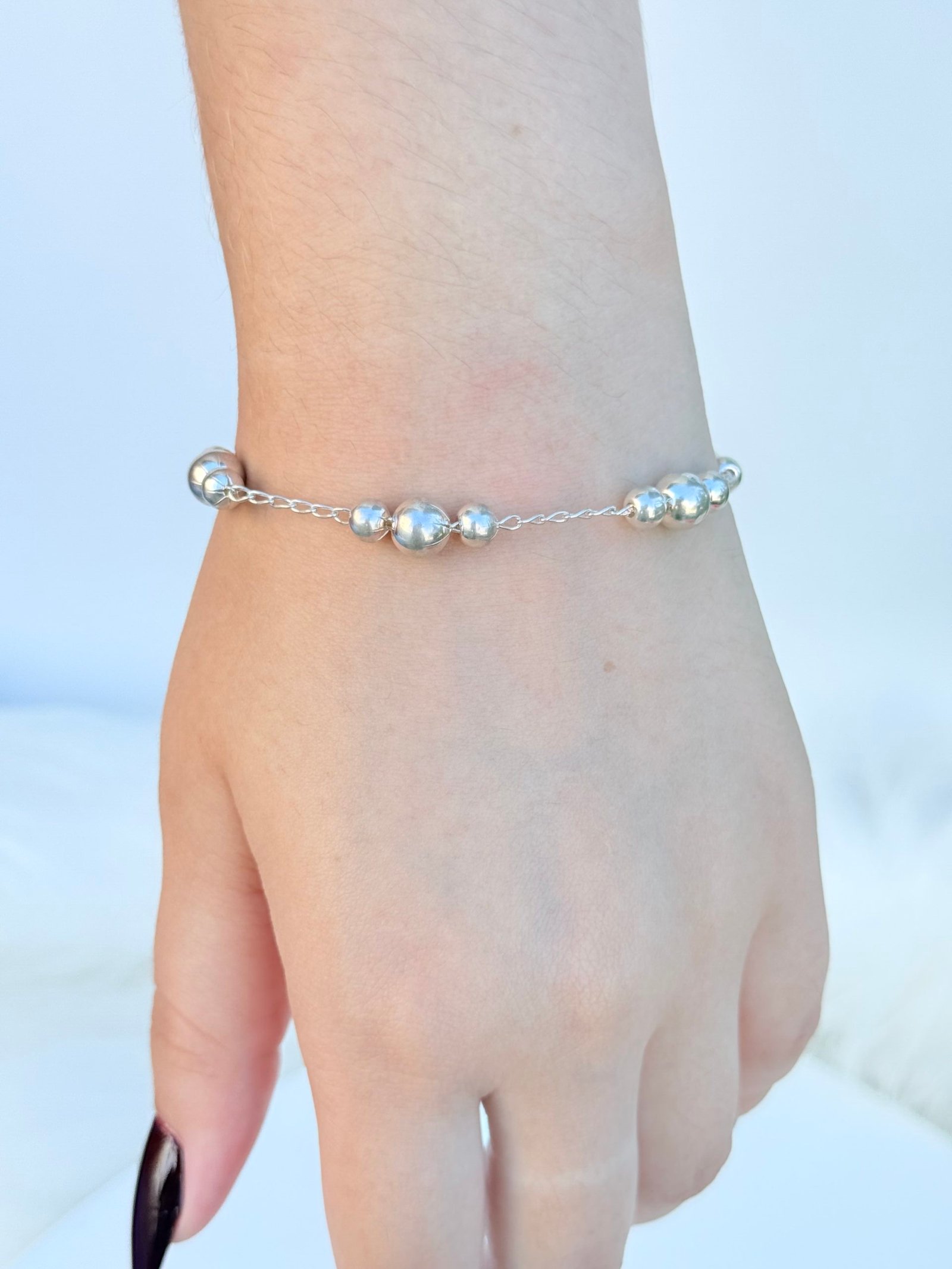 PULSEIRA EM PRATA 925 CONTEM ESFERAS