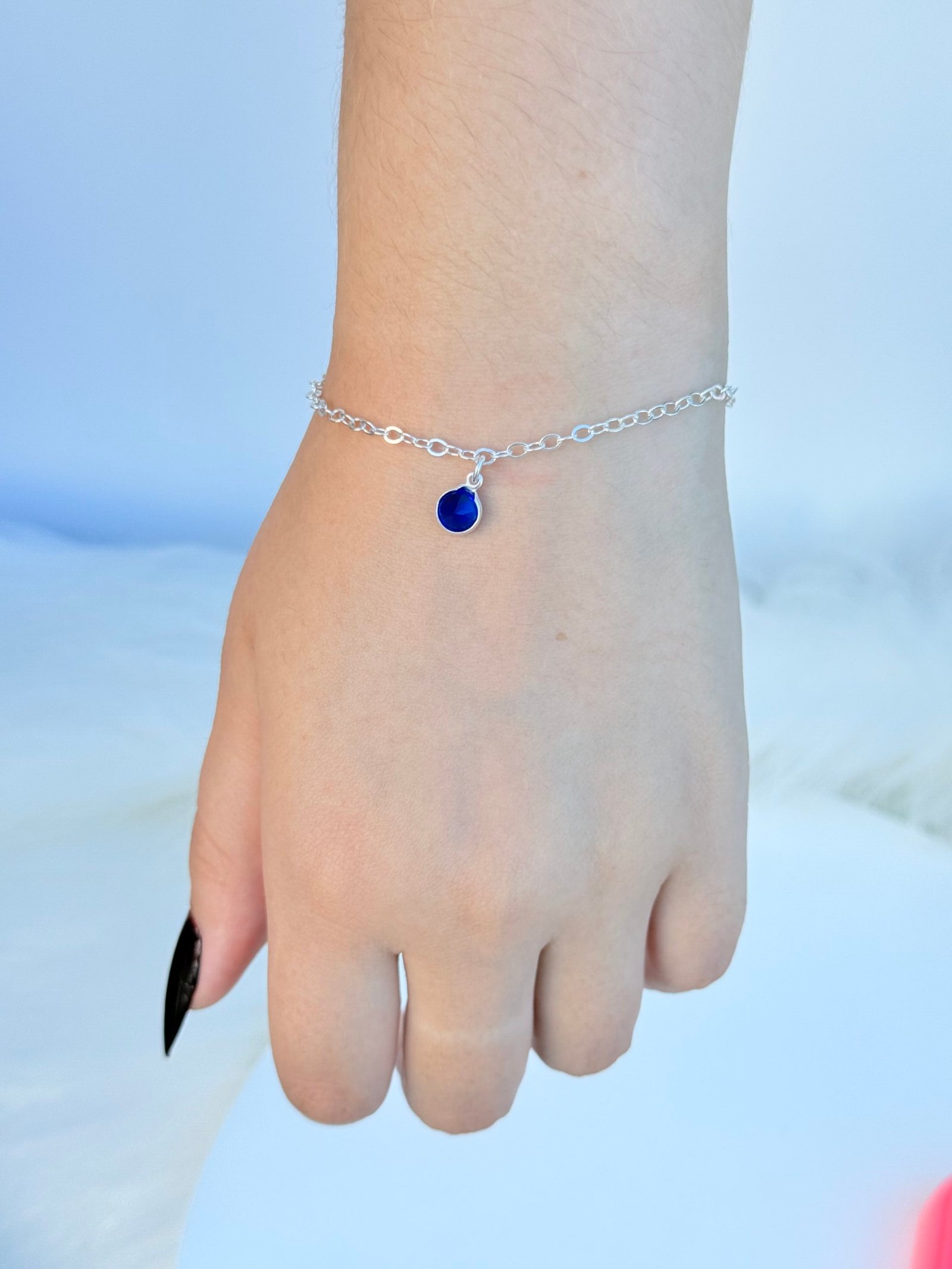 PULSEIRA EM PRATA 925 COM PINGENTE EM CRISTAL AZUL