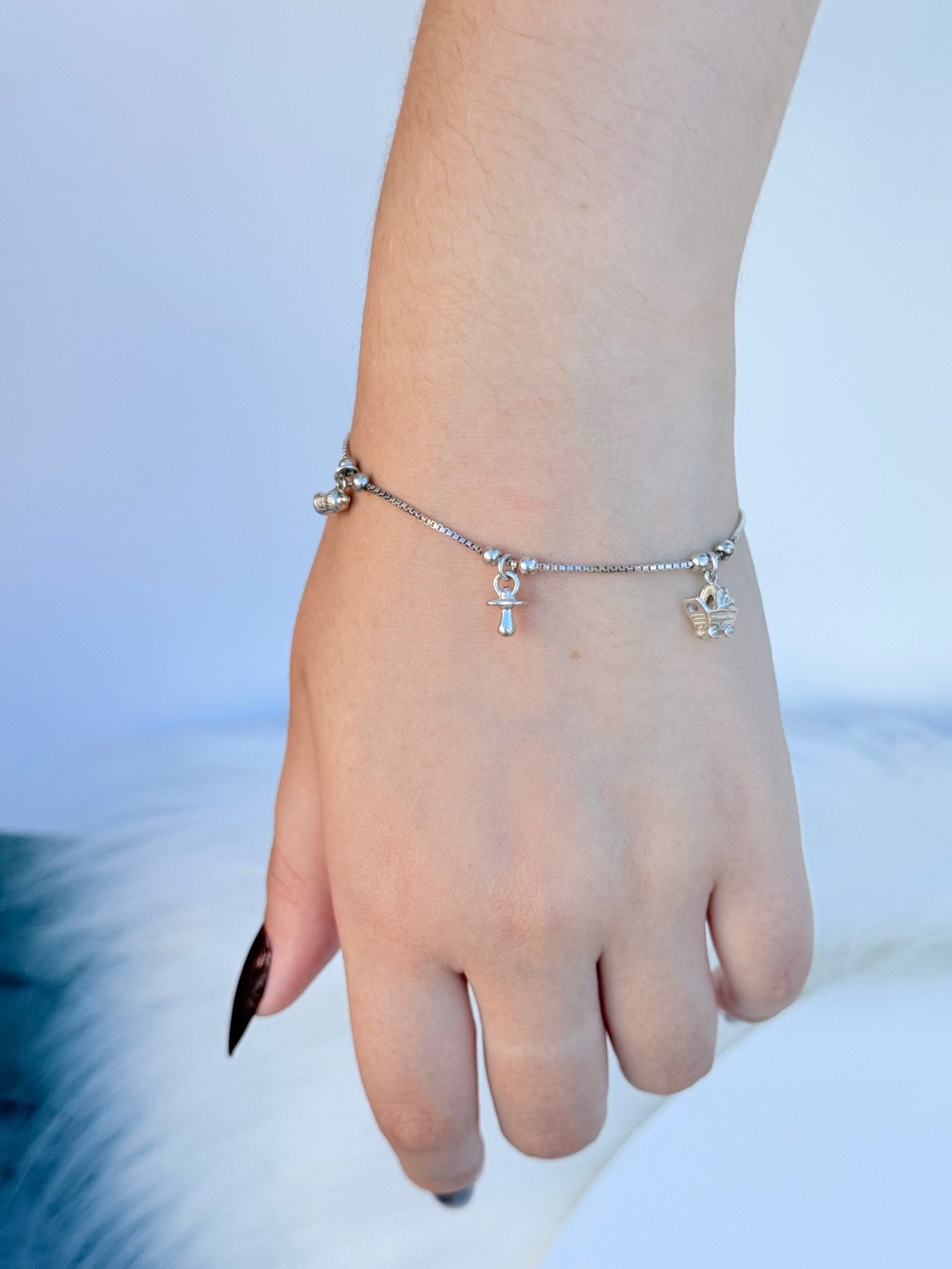 PULSEIRA EM PRATA 925 COM BERLOQUES